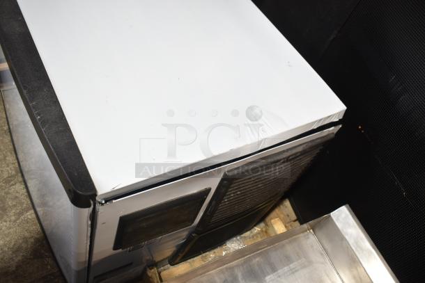 BRAND NEW Avantco 194MCF530A Ice Machine, 497 lb capacity, scratch and dent, white surface with visible imperfections.