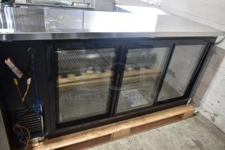 Brand new Avantco 178UBB72SHC 73" black counter height fridge, sliding glass doors, LED lighting, 115V, slight scratches.