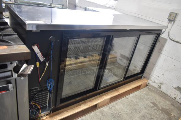 Brand new Avantco 178UBB72SHC 73" black back bar refrigerator with sliding glass doors and LED lighting, 115V, 1 phase.