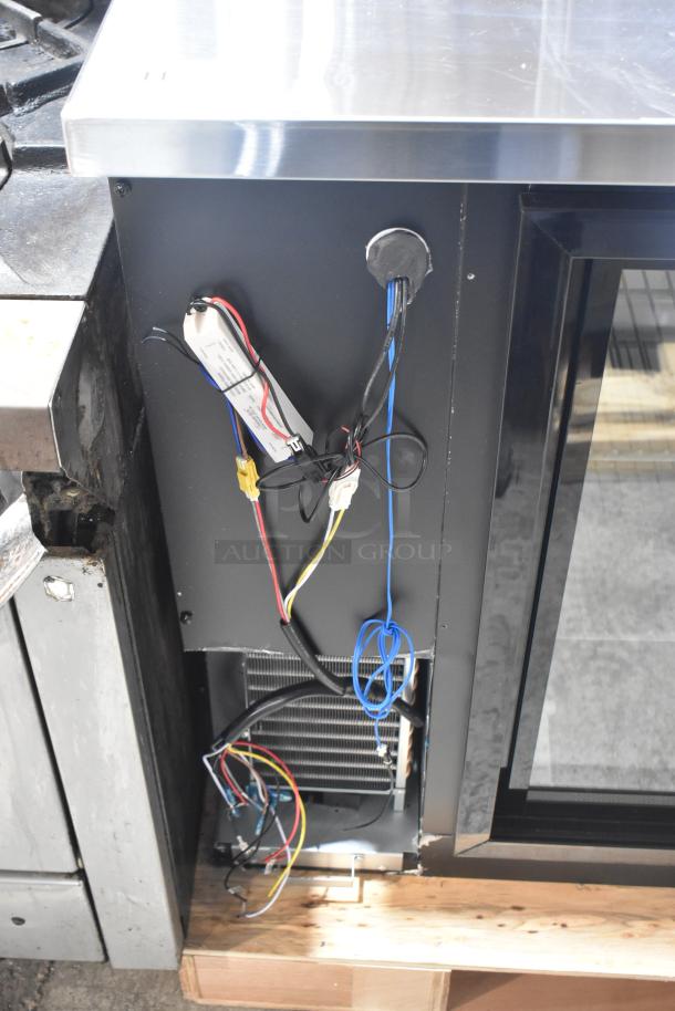 Brand new Avantco 73" back bar refrigerator, model 178UBB72SHC. Features include LED lighting, sliding glass door, and scratch and dent condition.