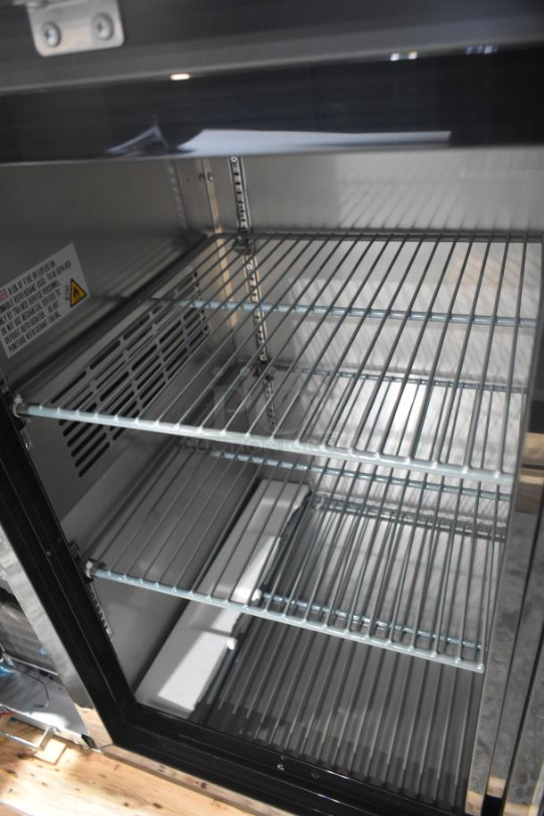 Brand new 2025 Avantco 178UBB72SHC 73" black bar refrigerator with narrow sliding glass doors and LED lighting, 115V.