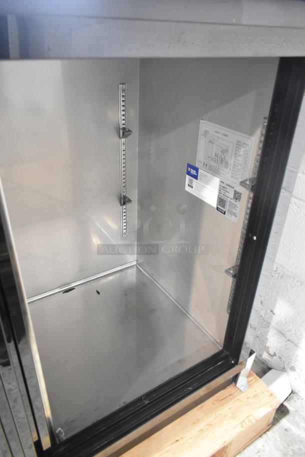 Brand new Avantco 178UBB72SHC bar refrigerator, 73", black, sliding glass doors, LED lighting, minor scratches.