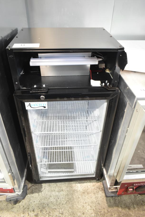 Brand new Avantco 360SC80 countertop merchandiser refrigerator. Scratch and dent condition. 115 volts, 1 phase. Adjustable shelves.