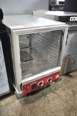 Brand new Avantco 177HPI1812 undercounter heated cabinet, clear door damaged, 120V, 1 phase, half-size, red control panel.