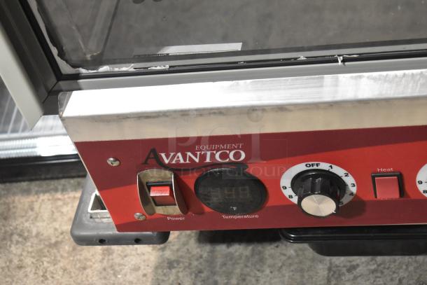 BRAND NEW Avantco 177HPI1812 heated holding cabinet, clear door damaged. Control panel with power and temp dials visible.