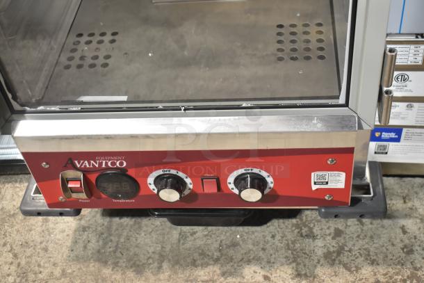 BRAND NEW Avantco 177HPI1812 heated holding cabinet. Clear door damaged; does not swing open. 120V, 1 Phase, scratch, and dent condition.