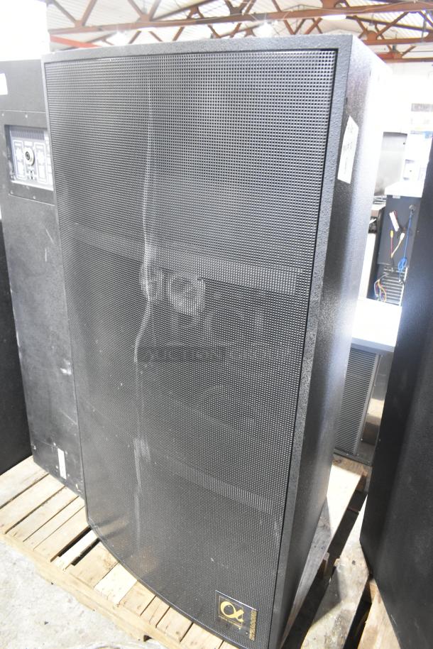 2 Dynacord Alpha X-1/60 loudspeakers in black, sturdy condition on pallet. Front grille and logo visible.