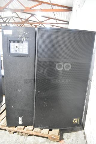 2 Dynacord Alpha X-1/60 loudspeakers on a pallet, black casing, visible connection panel, fair condition.