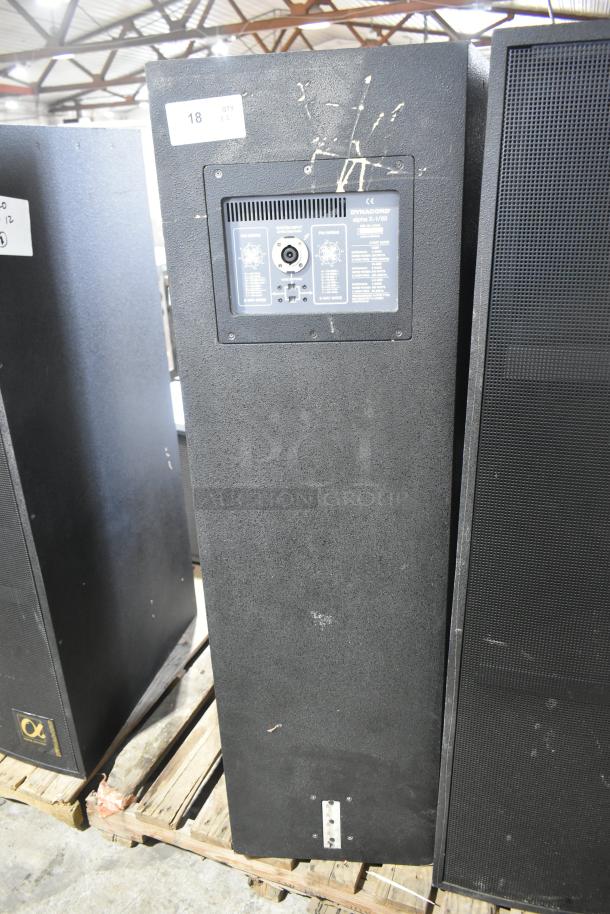 Two Dynacord Alpha X-1/60 loudspeakers on wooden pallet. Visible wear. Label with model details and CE marking shown.