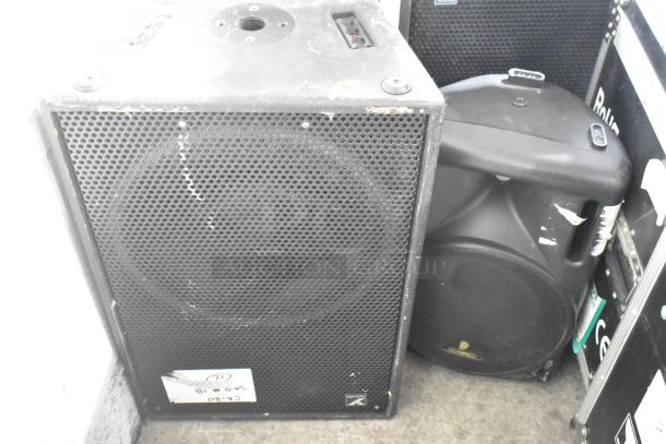 Yorkville TX4 and Eurolive B212A speakers, used, with visible wear, ideal for amplified sound setups.