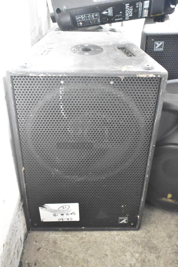 Yorkville TX4 and Eurolive B212A speakers, used condition, visible markings include model labels and a sticker with handwriting.