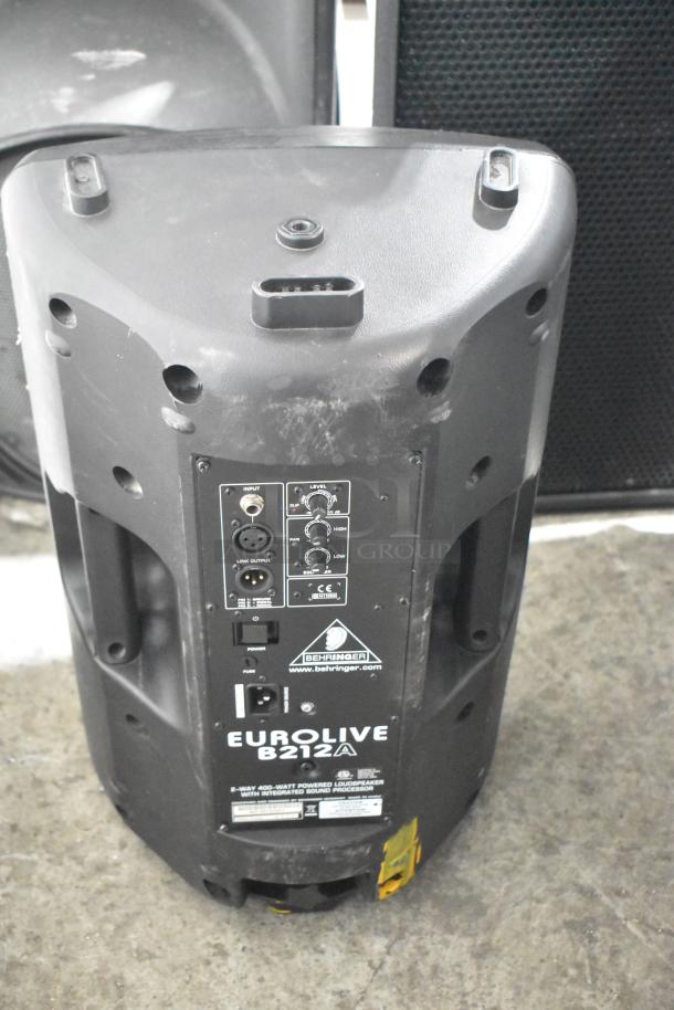 Behringer Eurolive B212A speaker, 400W, 2-way powered loudspeaker, integrated sound processor, input/output ports detailed.