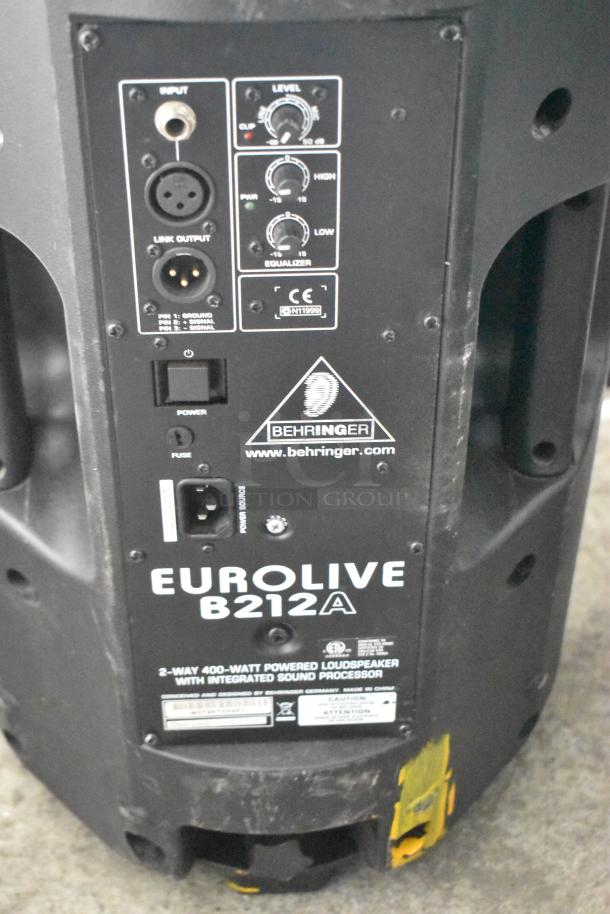 Behringer Eurolive B212A speaker with input ports, level controls, and power details shown. Model, specs, and branding visible.