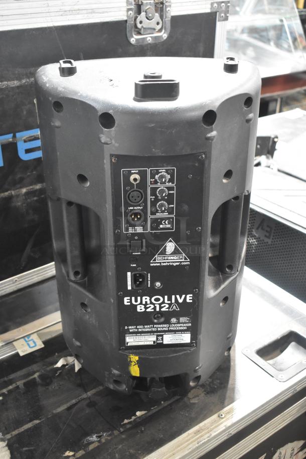 Eurolive B212A speaker with control panel, input/output ports, and Behringer branding. Includes Mackie C300 and Yorkville TX4.