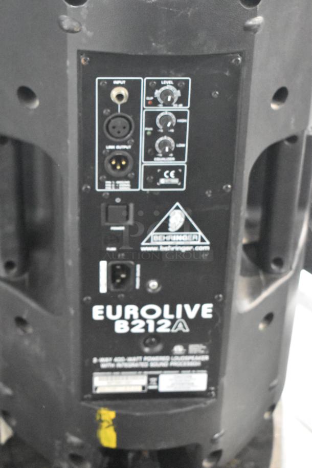 Behringer Eurolive B212A speaker rear panel with input, output, and control knobs visible. Good condition.