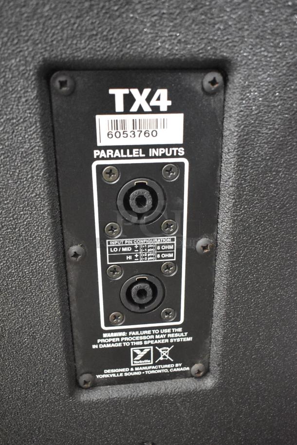 Yorkville TX4 speaker back panel showing parallel inputs, input pin configuration, and warning label.