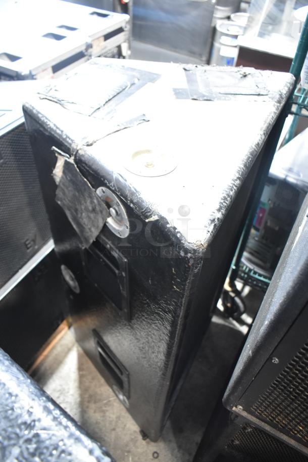 Two large black speakers with visible wear, metal handles, and corner protectors. Sold in pairs; double your bid value.