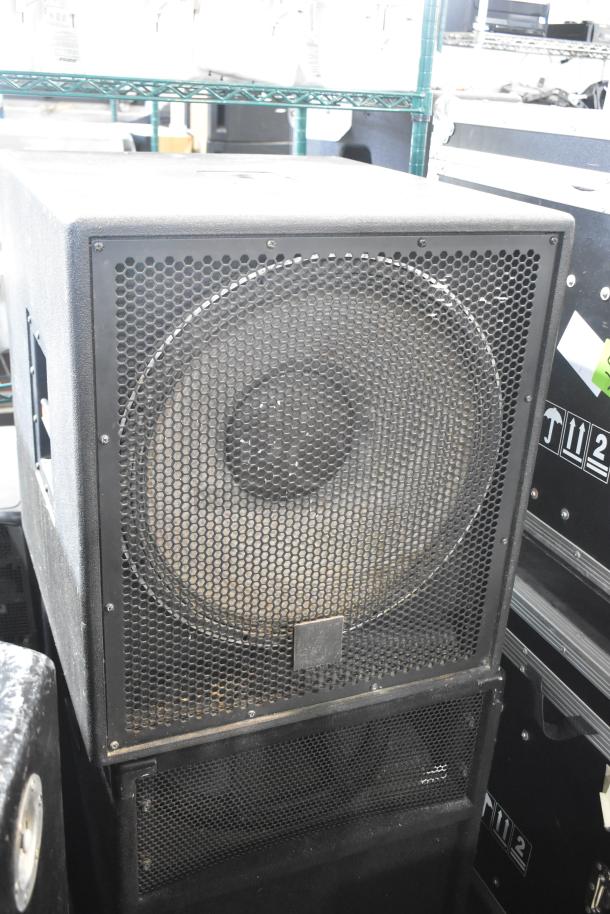 2 JBL M Pro MP418S 18" portable subwoofers in black, robust condition, metal grille, key for professional sound systems.