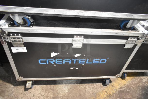 4 Createled AirBLADE-15 full color SMD panels in hard case with commercial casters; case shows minor wear, Createled logo.