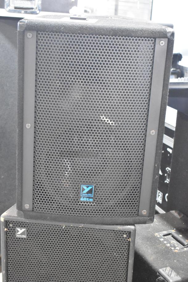Three Yorkville speakers, featuring Elite E12 and TX4 models, good condition, black grille, Yorkville branding visible.