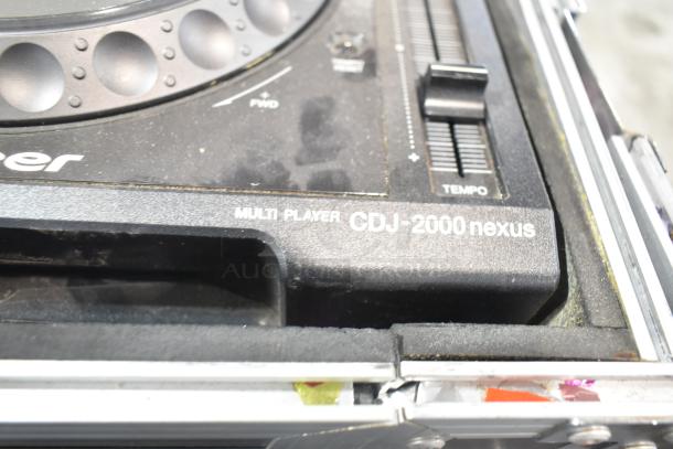 Pioneer CDJ-2000 Nexus Multi Player close-up showing label and tempo slider in used condition.