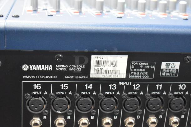 Yamaha IM8-32 Mixing Console rear view, showing inputs and model label. Made in Japan.