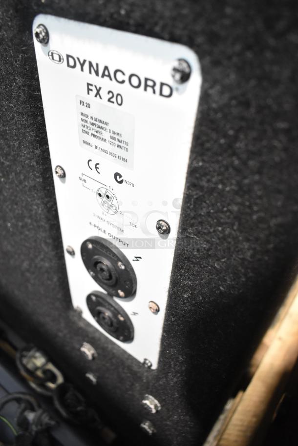 Close-up of Dynacord FX20 cabinet speaker label showing power ratings and connections. Speaker part of auction lot.