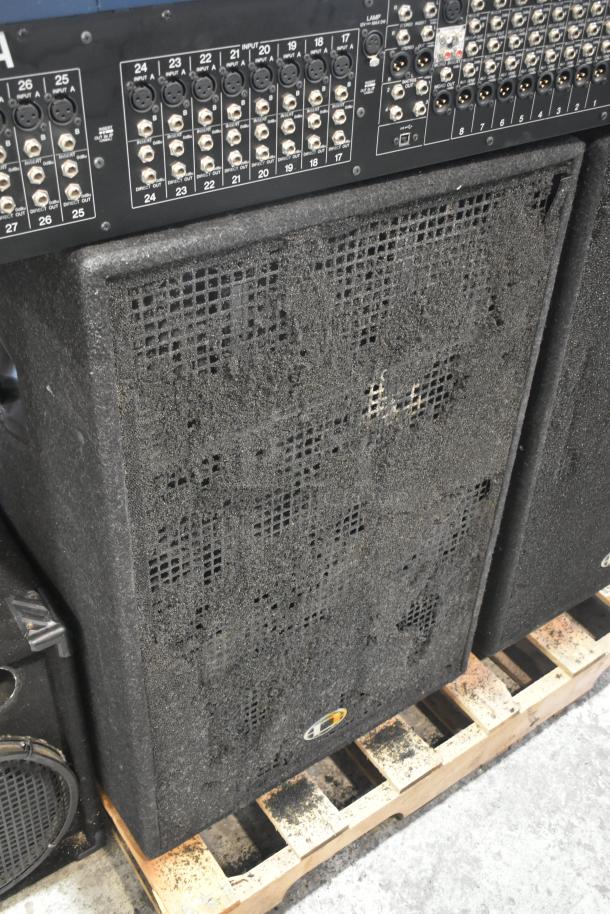 Yamaha IM8-32 sound console and Dynacord FX20 cabinet speaker, both in used condition, on a pallet display.
