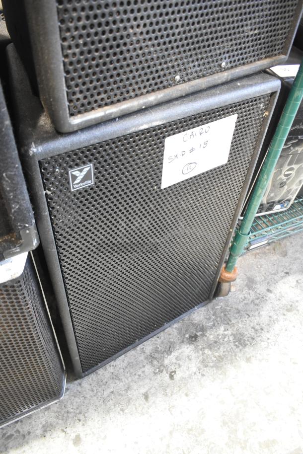 Three speakers, including Yorkville TX4 models. Good condition. Visible label: "Cairo SKIP #18."