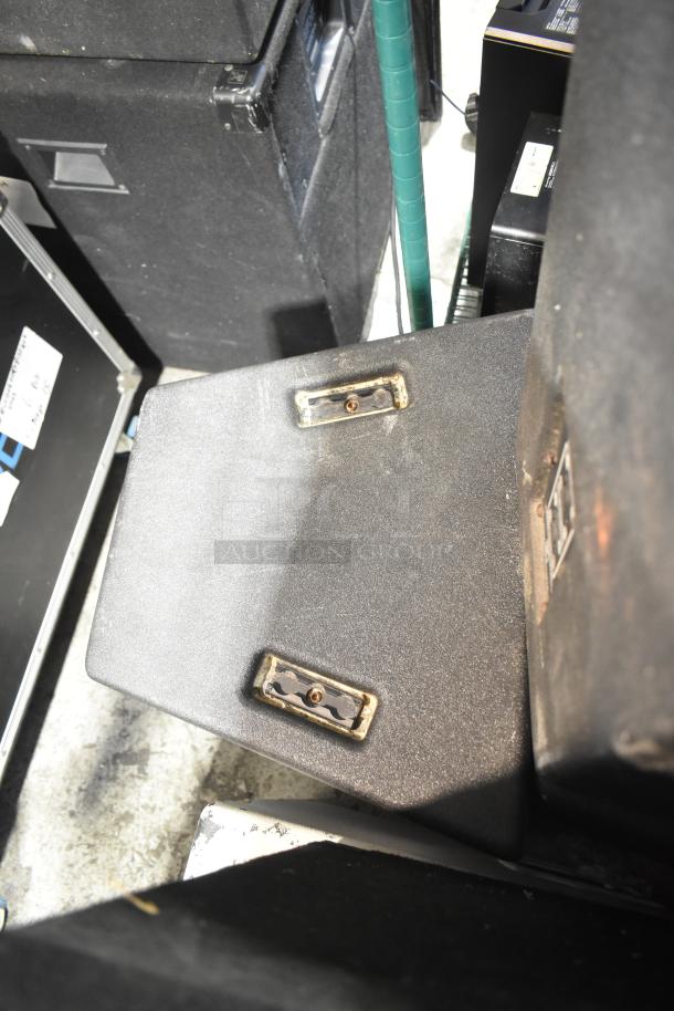 Yorkville TX4 speakers, black, fair condition, showing signs of wear. Features include sturdy casing and mounting hardware.