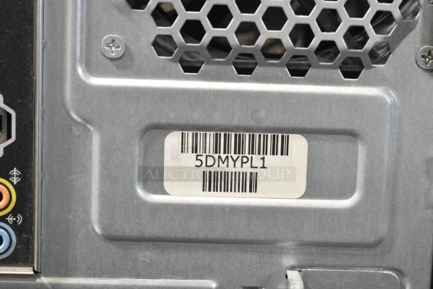 Dell DCMF Computer Tower, 115/230V, 1 Phase, barcode visible, good condition, rear panel details shown.