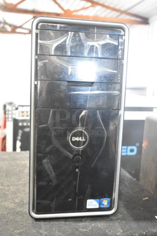 Dell DCMF computer tower, black. Features Intel Pentium sticker and Windows 7 label. 115/230V, 1 phase. Used condition.