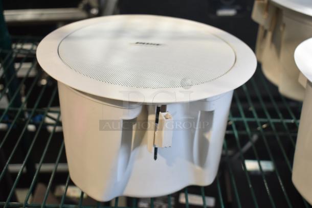 4 Bose FreeSpace DS 16F Loudspeakers in white, ceiling-mounted design, excellent condition, ideal for commercial audio.