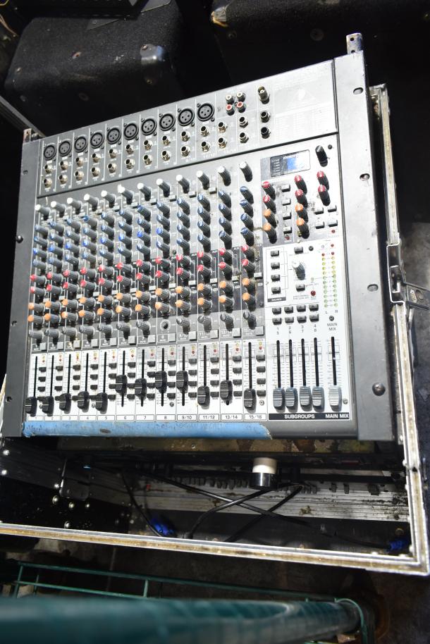 Behringer Xenyx 2442FX mixer in hard case, features 24 inputs, XENYX mic preamps, British EQ, and USB/audio interface.