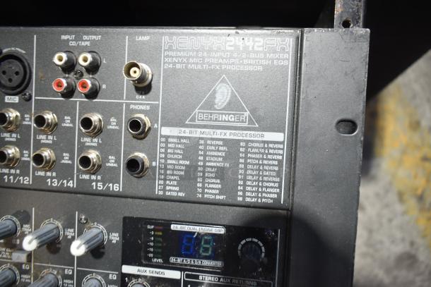 Behringer Xenyx 2442FX mixer, 24-input, 4/2-bus, with XENYX mic preamps, British EQ, 24-bit FX processor. Includes hard case.