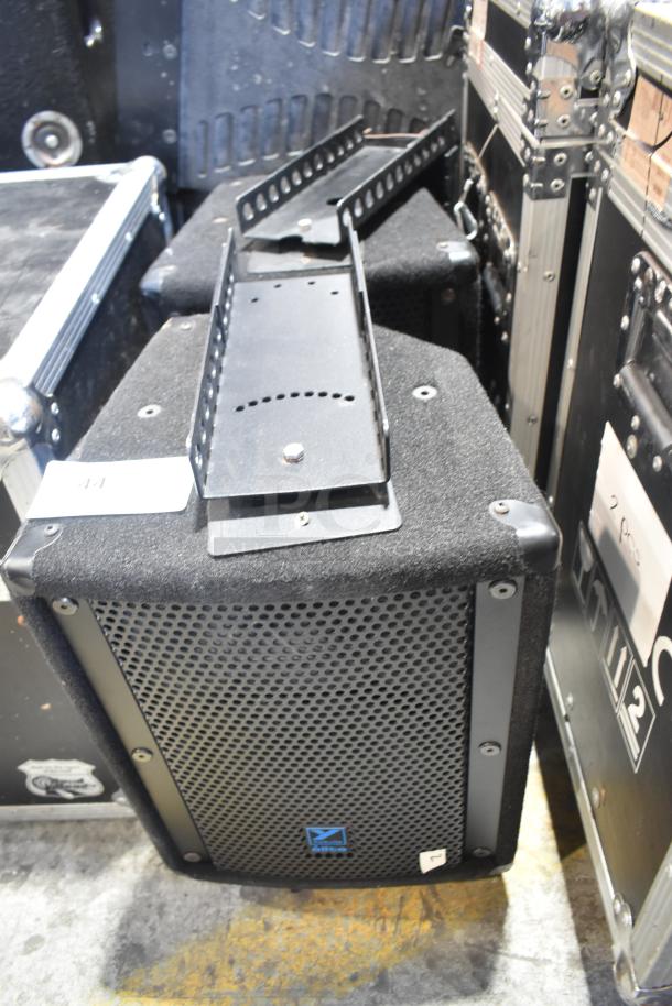 Two Yorkville Elite E10 8 Ohm speakers in good condition, featuring durable black casing and metal grill.