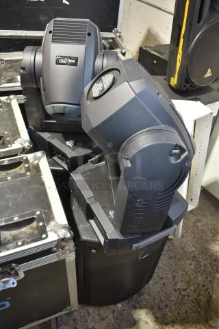 Four items including two Martin MAC250 Entour stage lights and two Yorkville NX520P loudspeakers, in used condition.