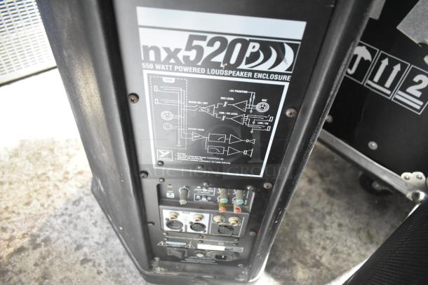Yorkville NX520P loudspeaker back panel, showing input/output connectors, 550-watt power label, and wiring diagram.