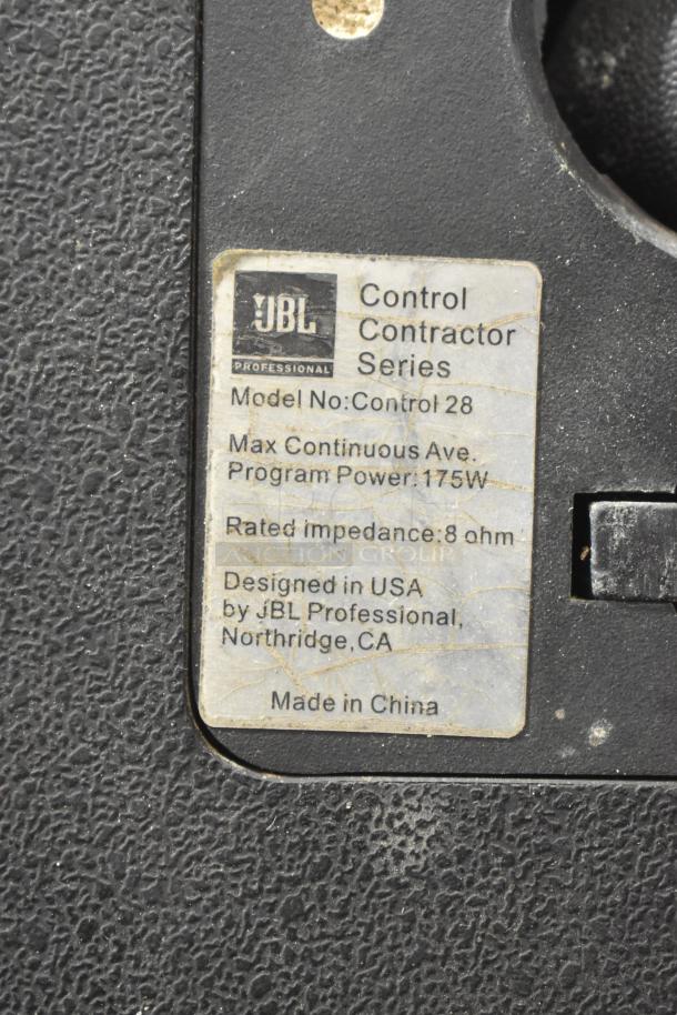 JBL Control 28 speakers label showing 8 ohm impedance, 175W power, and design details. Durable, ideal for professional audio.