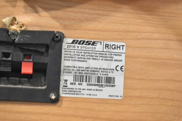 Bose 201 V Speaker label, showing model, compatibility with 10-120W amplifiers, and serial number 029298953010033BP.