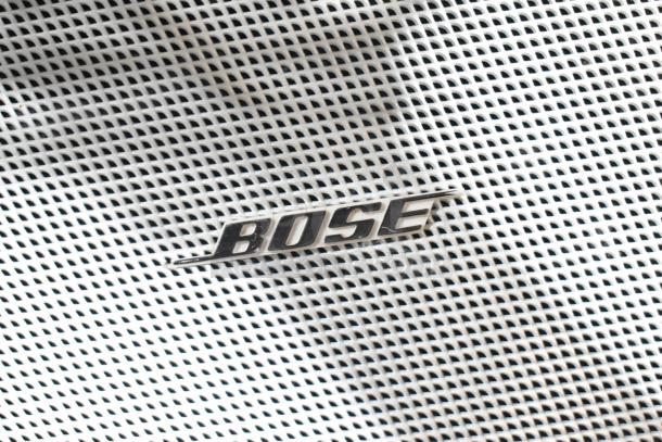 Set of 4 Bose FreeSpace DS 16F Loudspeakers, featuring a durable white grille and Bose logo, ideal for commercial audio.