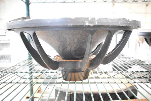 Two speakers, featuring Faital Pro 12HP1030 and Yorkville NX750P, 8 ohm, on metal shelving. Slight wear visible.