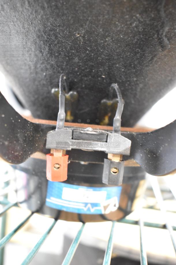 Two speakers: Faital Pro 12HP1030 and Yorkville NX750P. 8 ohm. Close-up shows connection terminals and branding label.