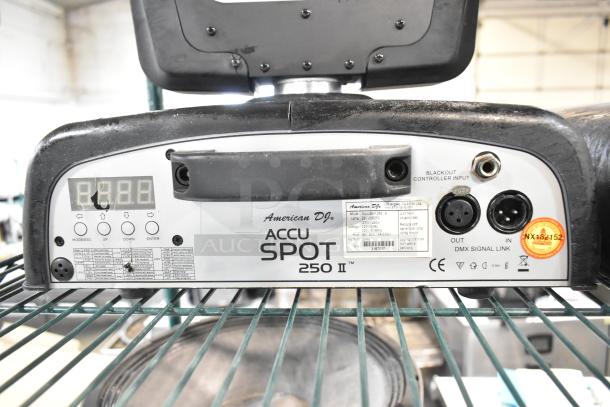 2 American DJ Accu Spot 250 II DMX moving head lights, condition visible; rear panel shows inputs and control interface.
