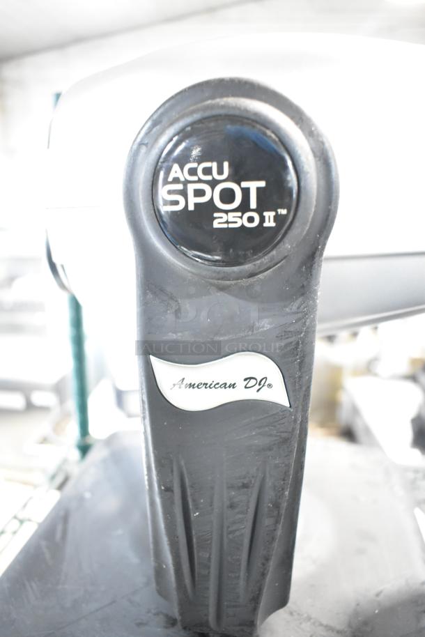 2 American DJ Accu Spot 250 II DMX moving head lights, good condition. Model markings visible on casing.