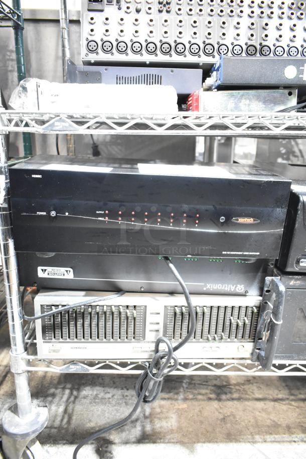Xantech 8X8 HD Component Video Switcher, two Altronix R2416300ULCB Power Supplies on metal shelf, visible cables.