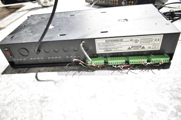 Xantech 8X8 HD Component Video Switcher, Altronix R2416300ULCB Power Supply, visible labels, cables, switches.