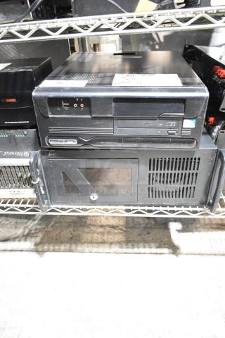 DVD playing unit and LG rack unit on metal shelf; visible ports and labels indicating model numbers, minor wear.