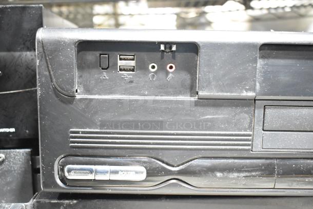 DVD playing unit with ports and buttons, part of a 2-item auction including an LG rack unit. Slight wear visible.