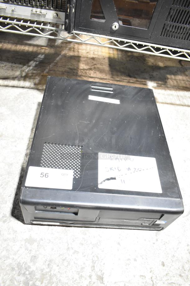 DVD player unit with LG rack, black, some scuffs, visible labels with "SAIRO" and "56 QTY". Auction: 2x your bid.